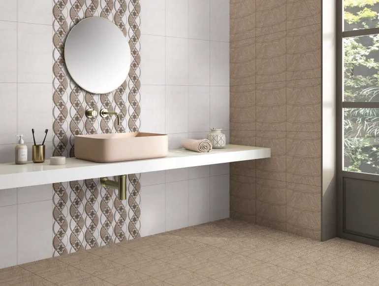 Elegant beige bathroom design featuring a countertop sink and large window